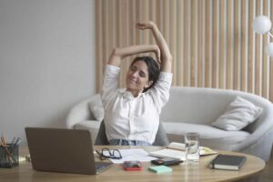 Workers Compensation for Remote Employees in North Carolina Tired Italian Lady Remote Employee Stretching Arms 2022 03 02 15 17 58 Utc 300x200