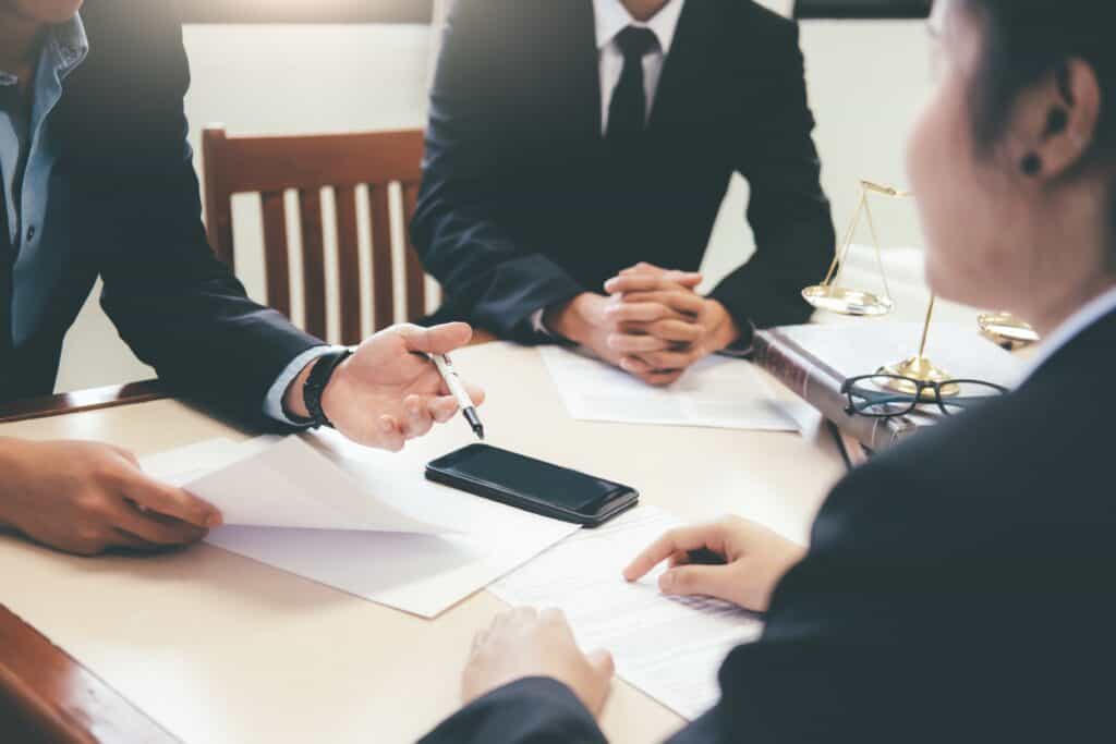 an employee meeting with a workers' comp adjuster
