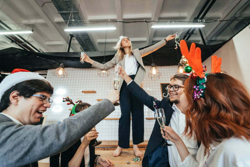 If I Was Injured At A Work Party, Am I Covered by Workers’ Compensation? Happy Colleagues In Office Celebrate Special Event 2021 08 27 21 23 44 Utc 1024x683