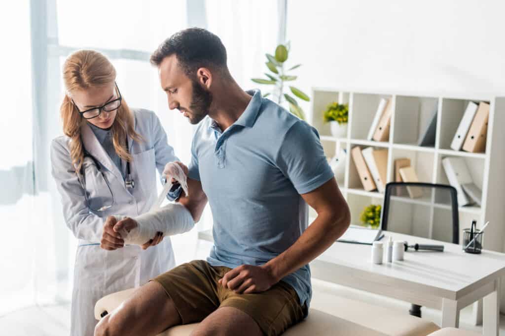Attractive Orthopedist Putting Bandage On Injured 2022 11 02 02 23 59 Utc 1024x683