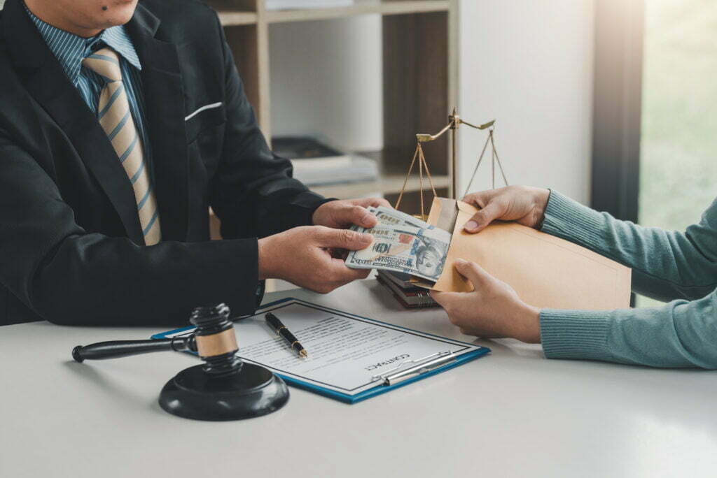 Why Should You Pay the Attorney Fee When the Insurance Company Has Wrongly Denied Your Claim? Businesswoman Gave The Lawyer Money To Help With T 2022 12 13 00 13 03 Utc 1024x684