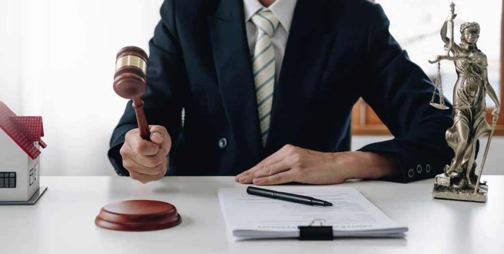 What Happens If My Employer Refuses to Acknowledge My Workers' Comp Claim? Lawyer Or Judge Holding Hammer Prepares To Judge T 2022 10 04 00 21 47 Utc 1024x517