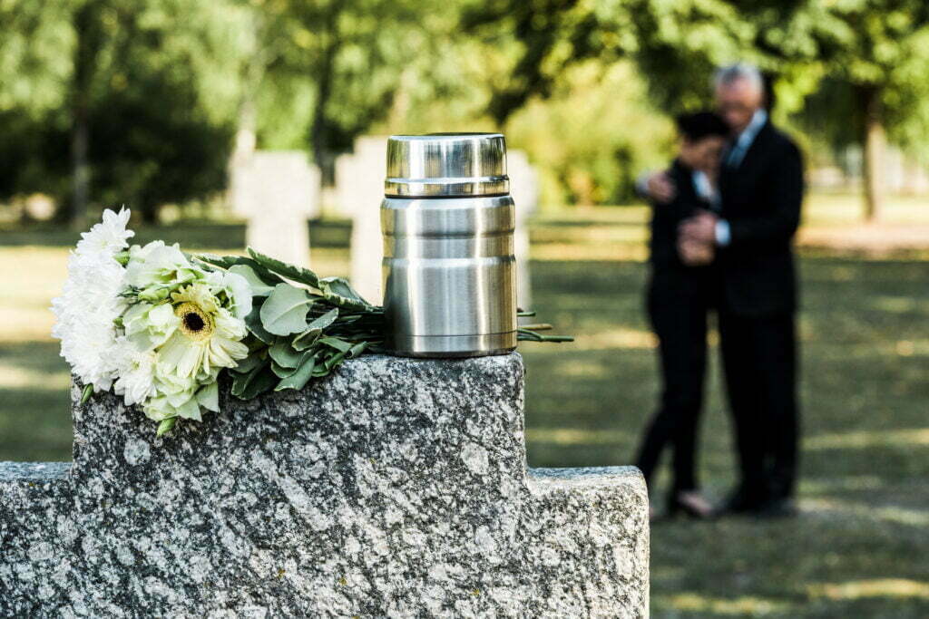 Selective Focus Of White Flowers And Cemetery Urn 2022 11 02 04 14 54 Utc 1024x683