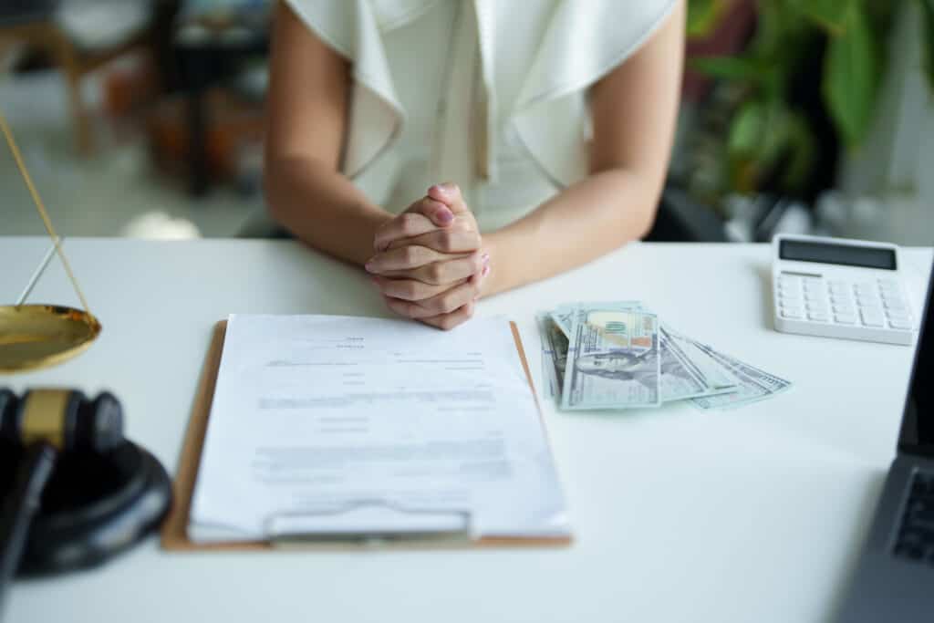 After Treatment Is Complete Do You Get a Settlement? 48707242 Law And Legitimacy Woman Holding Hands Expressing Concern During Litigation Consultation With Lawyer 1024x683