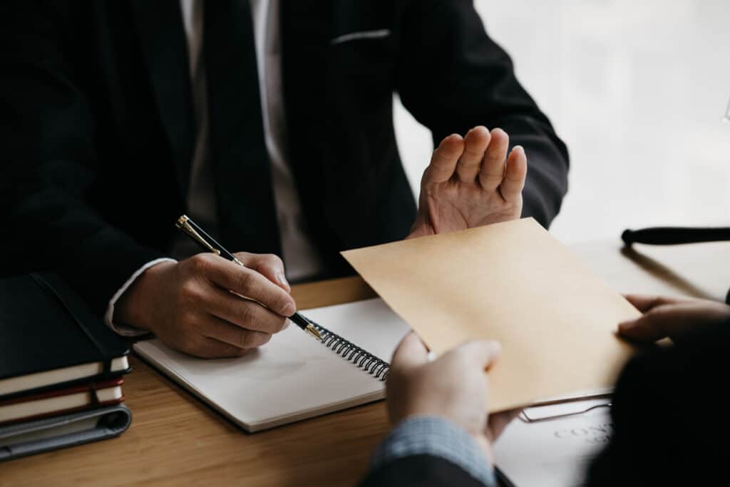 Is Your Case Closed If Your Workers' Comp Claim Is Denied? Business Man Raised Her Hand To Deny Accepting A B 2023 01 31 23 25 24 Utc 1024x683