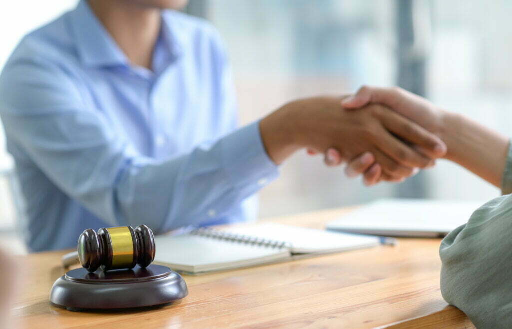 The Clincher Agreement: A Final Resolution of Your Workers’ Compensation Case Close Up Shot Of Shaking Hands When Reaching A Leg 2021 08 29 03 56 32 Utc 1024x658