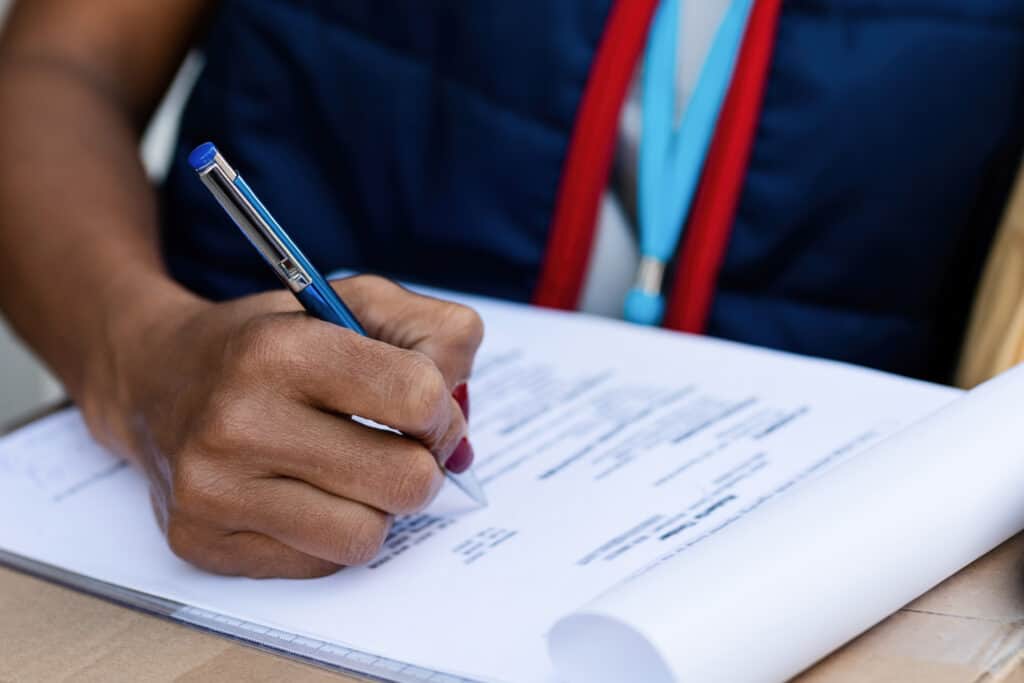 How Long Do I Have to File My Claim? Close Up Of Delivery Person Filing Paperwork 2022 09 21 17 15 14 Utc 1024x683