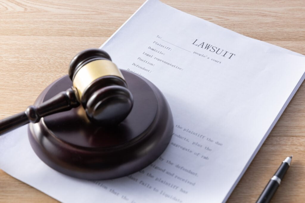High Angle Shot Of A Gavel And Lawsuit Papers On A 2023 01 13 04 57 25 Utc 1024x683