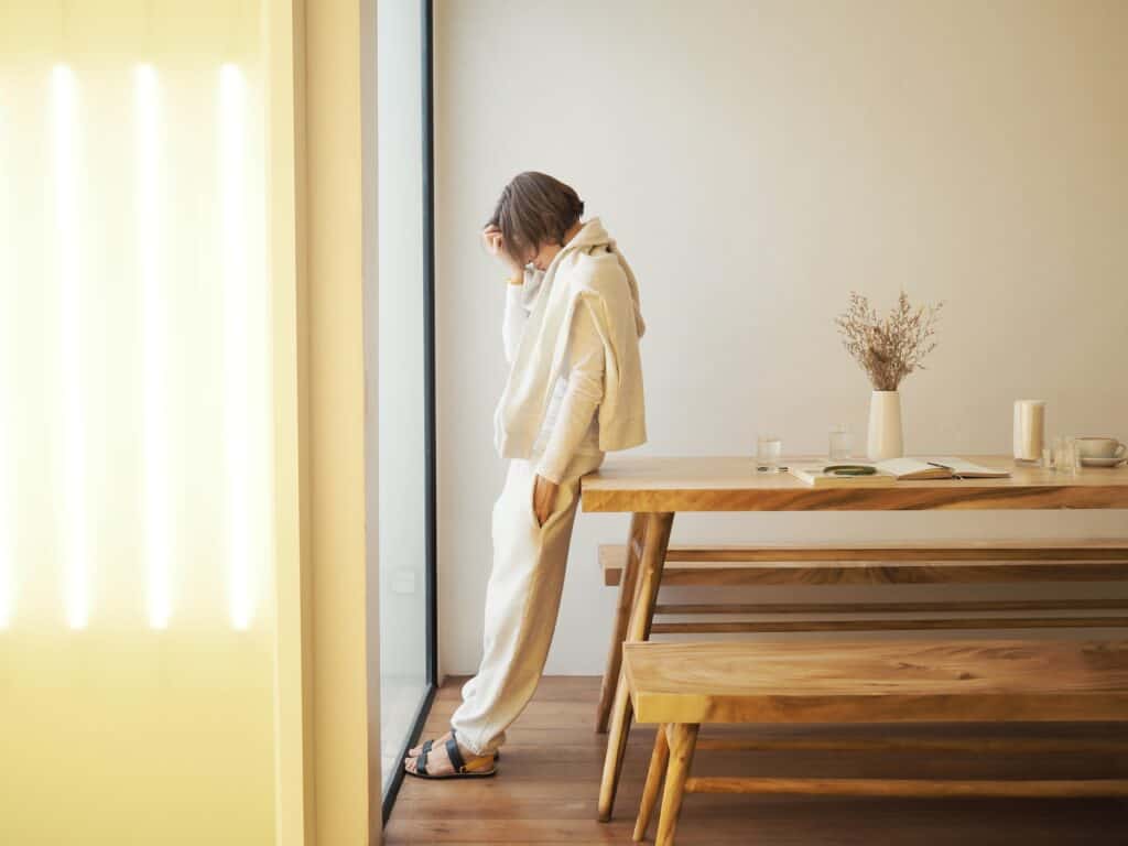 My Employer and the Insurance Company Put Me Through the Ringer. Do I Get Money for Pain and Suffering Under Workers' Compensation? Sad Woman Near The Window Mental Health 2022 11 10 18 51 06 Utc 1024x768