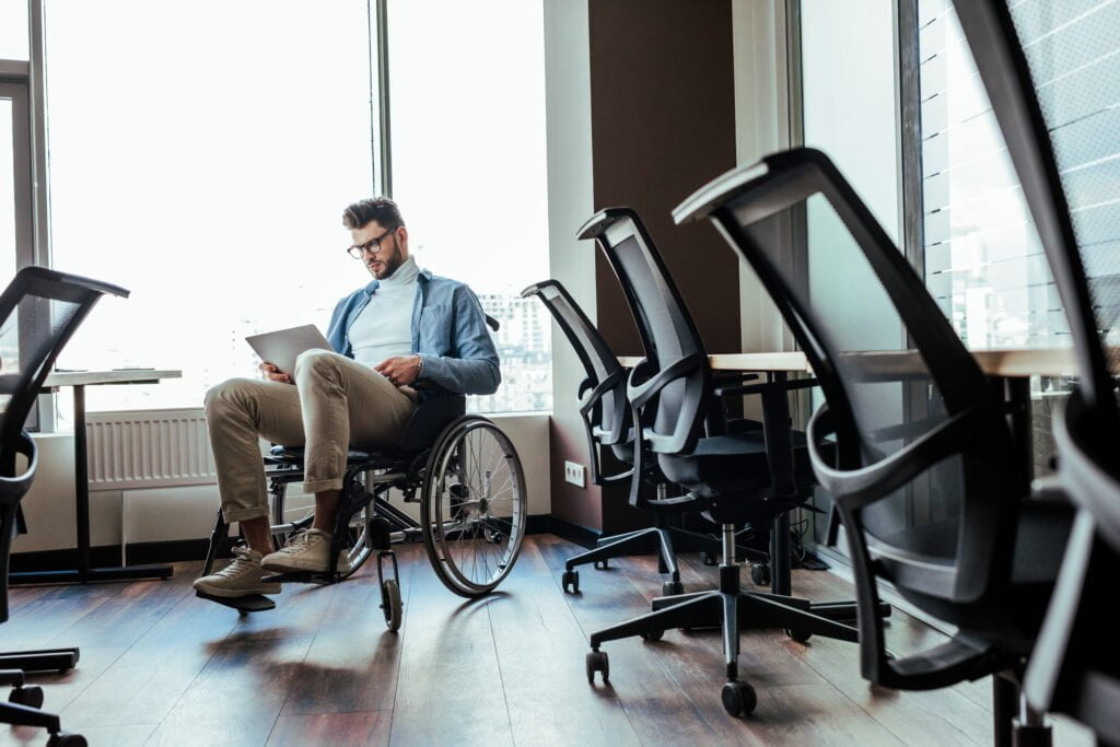 Workers’ Comp Tip of the Day: Being Placed on Light Work Duty After an Injury at Work Selective Focus Of Disabled It Worker On Wheelchai 2022 12 16 20 12 50 Utc 1024x683