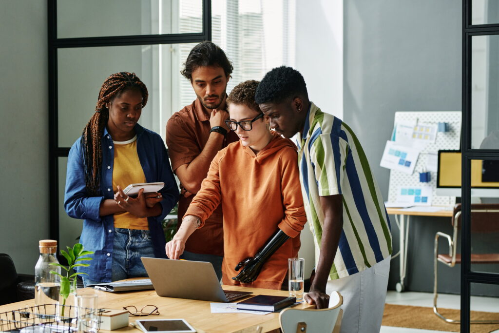 NC Partial Disability Benefits: Could You Be Leaving Money On The Table? Young Confident Designer With Partial Arm Pointing 2022 11 12 14 55 11 Utc 1024x683