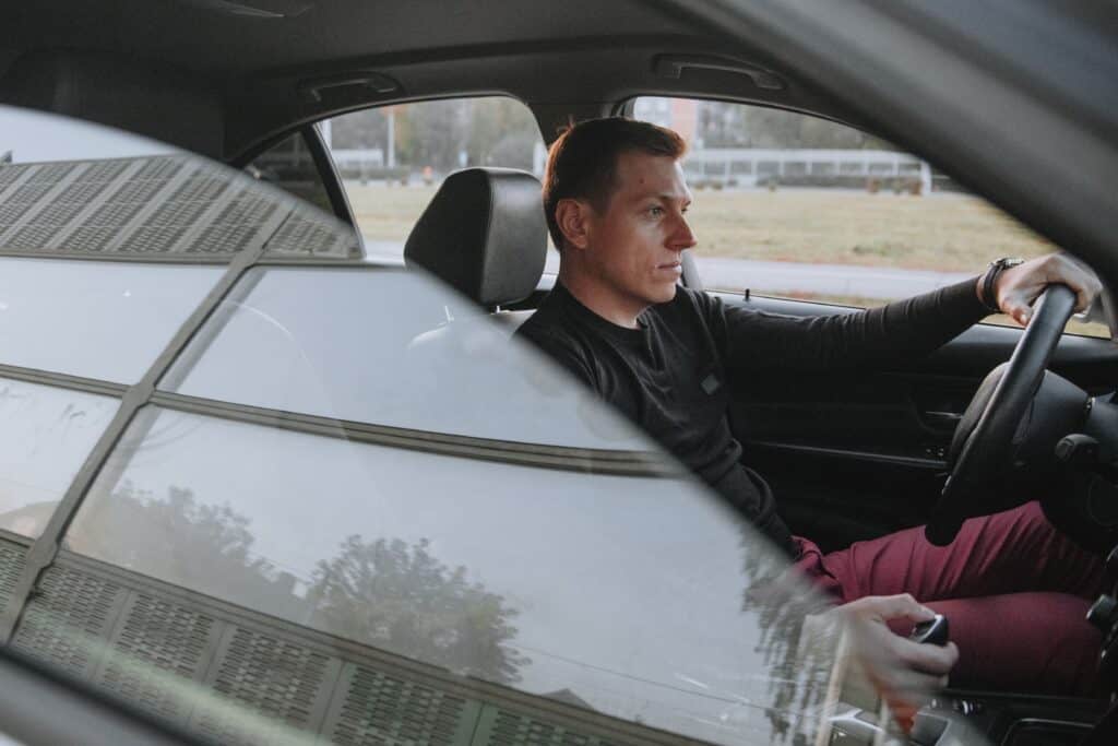 A Handsome Young Man Driving A Car Going To Work 2022 11 16 10 37 13 Utc 1024x683