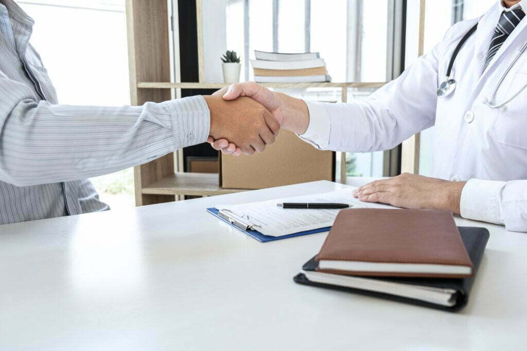 A Positive Attitude and Good Relationships Can Go a Long Way in Workers' Comp Claim Doctor And Patient Shaking Hands After A Good And 2022 11 17 06 07 21 Utc 1024x683